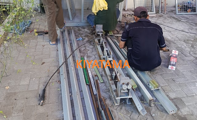 Perakitan Pengaman Lift Barang